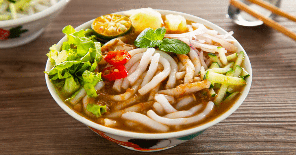 How to make a vegetarian laksa that tastes like the real thing — deeply spiced, coconut-rich, and ready in 30 minutes