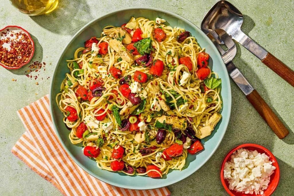 Mediterranean Pasta with Olives, Artichoke, Tomatoes and Herbs Mediterranean Pasta with Olives, Artichoke, Tomatoes and Herbs