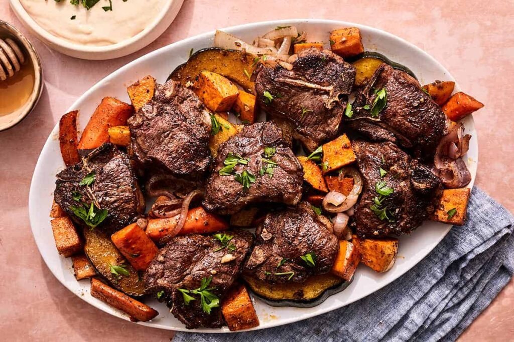 Mediterranean Baked Lamb Chops with Roasted Vegetables